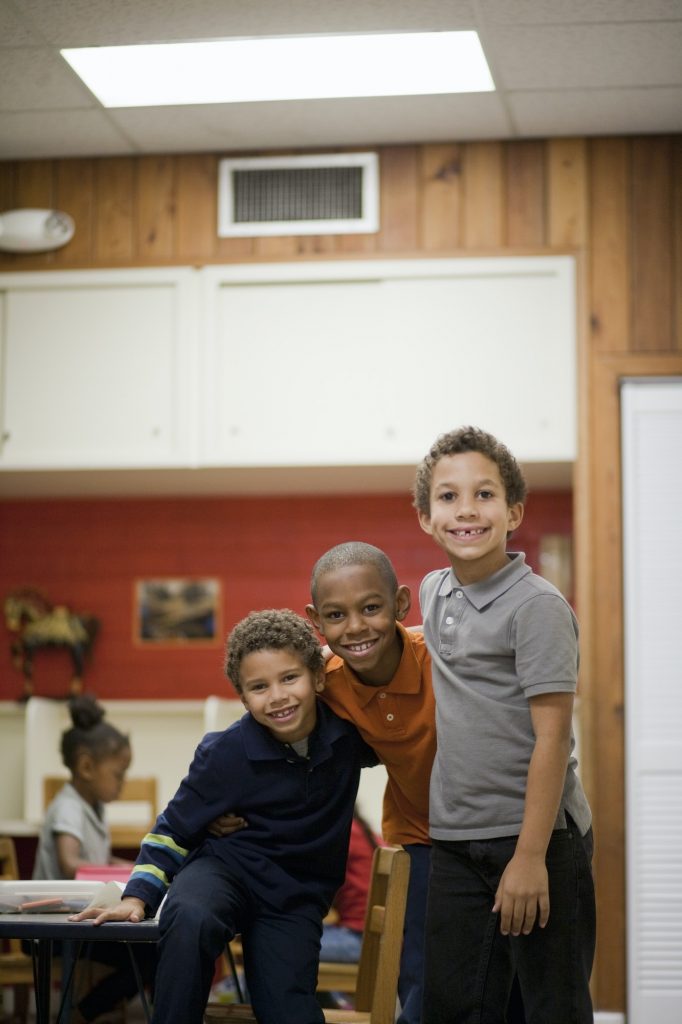 Children smiling in classroom